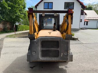 Kolový nakladač KOMATSU SK714 - 7
