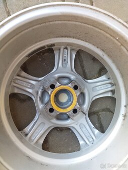 ALU disky 15", rozteč 4x100, ET 35 - 7