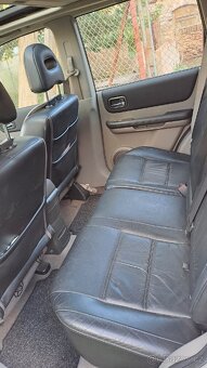 Nissan X-trail 2,2 TDI - 7
