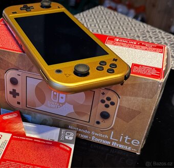 Nintendo Switch Lite Hyrule Edition + 12M NSO + EP - 7