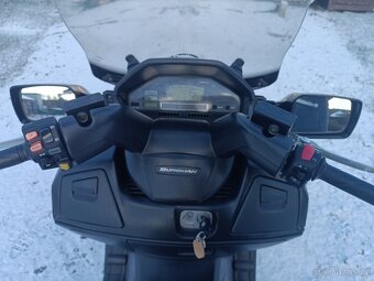 Suzuki Burgman 650. Zamluveno do 31.3 - 7