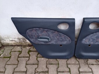 Tapecy Ford Escort 96- - 7