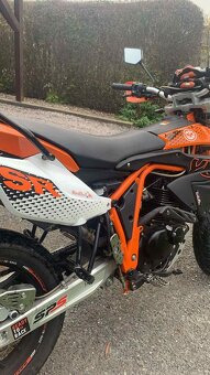 Yuki 125i SR - 7