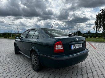 Škoda Octavia 1 1.6 74Kw / Benzín / - 7