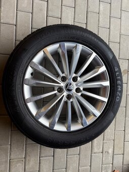 Alu kola Škoda Trinity18” stříbrné 7x18” ET 43 s pneu - 7