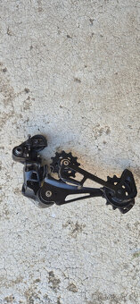 Přehazovače a páčky Sram, Shimano - 7