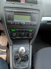 Škoda octavia  2,1.6 MPI 75kw  benzín - 7