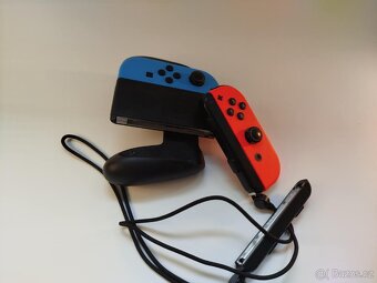 Prodám Nintendo Switch, 2 hry a puzdro - 7