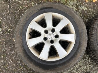 Zimní terénní kola 215/65/16 AT, vzorek 8,5mm 5x112 - 7