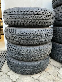 Plechové disky 6x139 se zimnimi 205/80/ r16 - 7