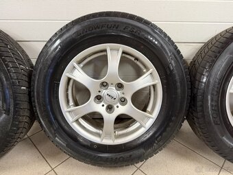 Zimní sada Suzuki Grand Vitara 2 215/70 R16, 5x114,3 - 7