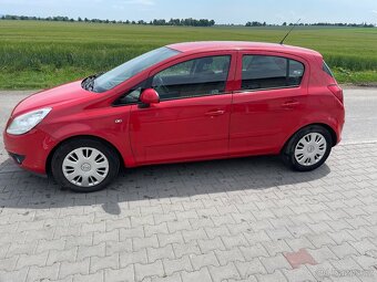 Opel Corsa 1,0i 44kw rok 2007-klima - 7