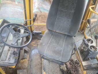 Traktorbagr Komatsu WB60A - 7