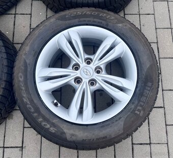 Hyundai Tucson, i35 - 17" alu + zimní 225/60 Pirelli 7-8mm - 7
