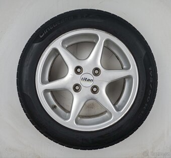 Ford Focus - 15" alu kola - Letní pneu - 7