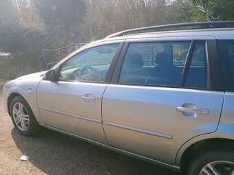 Ford Mondeo 1,8 - 7