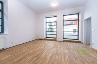Prodej bytu 2+kk, 57m2 s balkonem 6,5m2, parkovací stání v p - 7