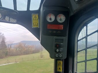 CAT 289C pásový nakladač - 7