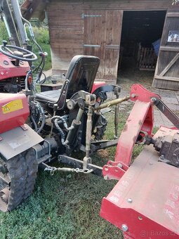 Nový multifunkční pásový traktor - 7
