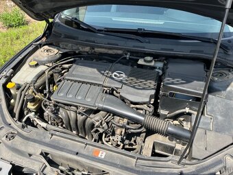 Mazda 3 1,4 - 7