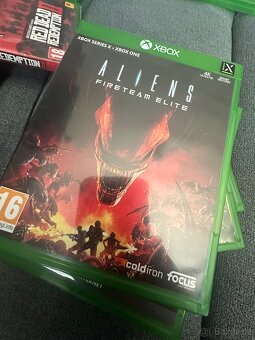 Xbox One X 1TB + 9 her - 7