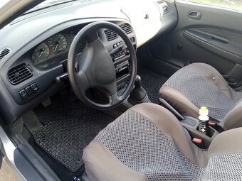 Mazda 323 - 7