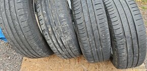 195/65 R15 letní pneu obuté na 15" Alu kola Dezent, 5x100 - 7