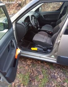 Prodám Roomster Scout 1.6 TDI 77kw - 7