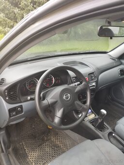 NISSAN ALMERA 1.5 - 7