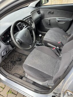 Kia Rio 2005 Najeto 231057 Praskl rozvodový řemen - 7