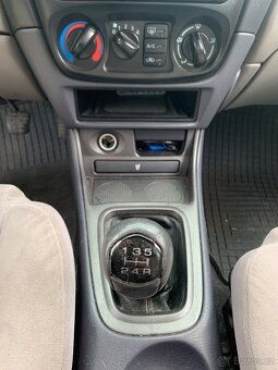 Almera 1.5 benzín 2002 - 7