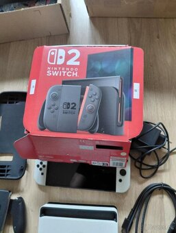 Nintendo Switch OLED + 3 hry - 7