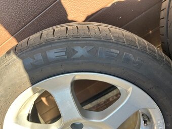 Alu kola+nexen Daewo Nubira 2004 -4x114,3 mm. 56,6 mm. - 7