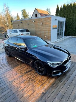 BMW M550i xDrive - 7