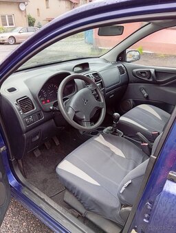 Mitsubishi Space Star 1.3 rok 2002 - 7
