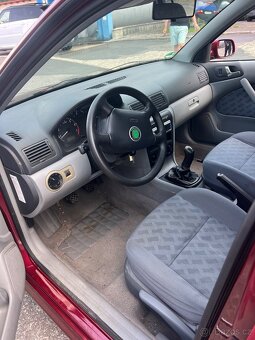 Škoda 1.6i,74KW - 7