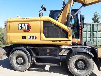Kolový otočný bagr CAT M318 - 7