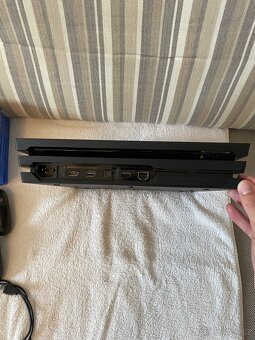 PlayStation 4 Pro 1 TB - 7