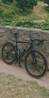 Silniční kolo silnička Shimano Sram - 7