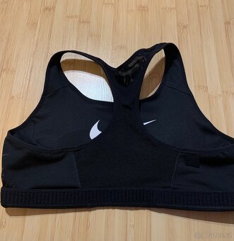 Sportovní podprsenka zn. Nike vel. L - 7