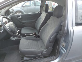 Opel Corsa 1.2i - 7