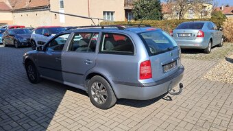 Škoda Octavia Kombi 1.6i / 75KW - 7