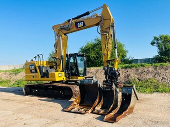Pásové rypadlo Caterpillar 323 - 7