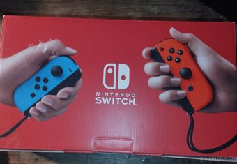 Nintendo switch + další doplňky - 7