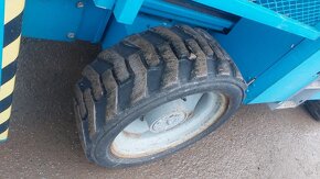 Terenní nůžková pracovní plošina Genie GS-3390RT - 7
