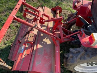 Traktor s rotovatorem - 7