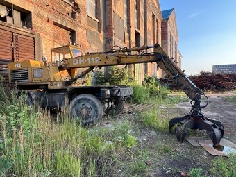 Kolový bagr DH 112 - drapák - 7