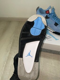 Jordan 4 University Blue - 7