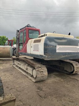 Pásový bagr CASE CX240B - 7