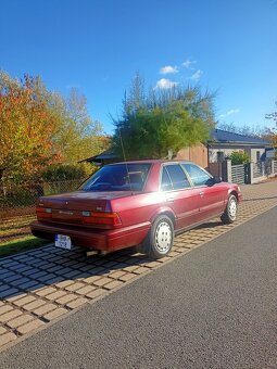 Nissan Stanza XE 2.4 - 7